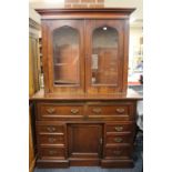 AN UNUSUAL ANTIQUE CARVED MAHOGANY GLAZED BOOKCASE WITH DESK BASE H -206 CM W -139 CM