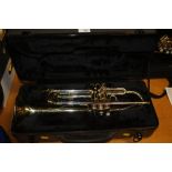 A CASED ROY BENSON TRUMPET (MISSING MOUTHPIECE)