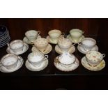 A COLLECTION OF VINTAGE PARAGON AND OTHER GILDED CHINA CUPS AND SAUCERS (11)