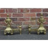 A PAIR OF LATE 19TH EARLY 20TH CENTURY BRASS FIRE DOGS, in the classical Empire style, H 38 cm (2)