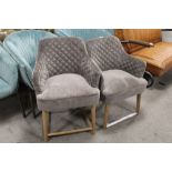 A NEAR PAIR OF MODERN UPHOLSTERED ARMCHAIRS (2)