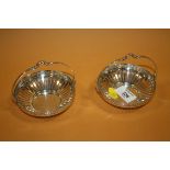 A PAIR OF WMF CIRCULAR SILVER PLATED BASKETS, with openwork and Greek key design border, basket Dia