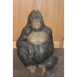 A LARGE OUTDOOR RESIN FIGURE OF A SEATED GORILLA H-114CM