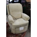 A YELLOW UPHOLSTERED RISE / RECLINE ARMCHAIR