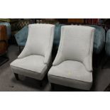 A MODERN PAIR OF UPHOLSTERED CHAIRS