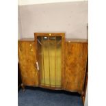 A WALNUT GLAZED DISPLAY CABINET WITH HAIRY PAW FEET, W 136 CM