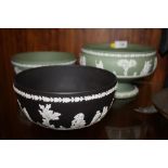 A WEDGWOOD GREEN JASPERWARE IMPERIAL FOOTED BOWL TOGETHER WITH TWO WEDGWOOD JASPERWARE FRUIT