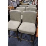 A SET OF SIX MODERN UPHOLSTERED SWIVEL BAR STOOLS