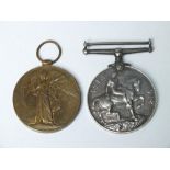 A PAIR OF WWI MEDALS - C . BURNETT & R . WARICK REG