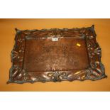 AN ARTS AND CRAFTS HAMMERED FINISH COPPER WALL HANGING TRAY