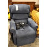 A BLUE UPHOLSTERED RISE / RECLINE ARMCHAIR