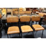 A SET OF EIGHT MODERN TAN LEATHER DINING CHAIRS