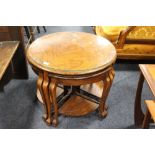 A WALNUT ART DECO STYLE NEST OF FIVE TABLES DIA. CM