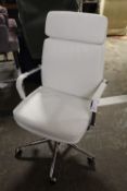 A MODERN WHITE SWIVEL OFFICE CHAIR