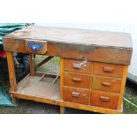 A LARGE WOODEN WORK BENCH A/F