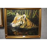 A GILT FRAMED OIL ON BOARD DEPICTING A SWIMMING TIGER SIGNED MEGAN EMMERSON