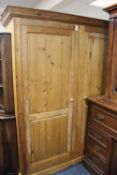 A MODERN DOUBLE HONEY PINE WARDROBE H-196 CM W-163 CM