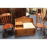 A MODERN TELEPHONE SEAT AND TWO CHAIRS