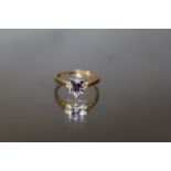 A HALLMARKED 18 CARAT GOLD AMETHYST RING, approx weight 2.3g, ring size L