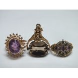 AN ANTIQUE STYLE GEMSET YELLOW METAL RING, together with an amethyst and yellow metal dress ring -