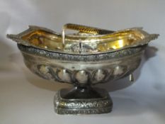 A HALLMARKED RUSSIAN SILVER SWING HANDLED BASKET, stamped to the gilded bowl, handle and the base,