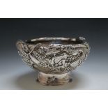 AN IMPRESSIVE AND IMPOSING JAPANESE SILVER DRAGON BOWL, carrying the Jungin mark to base and