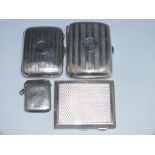 THREE EARLY 20TH CENTURY HALLMARKED SILVER CIGARETTE CASES, together with a hallmarked silver