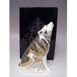 A ROYAL CROWN DERBY WOLF PAPERWEIGHT, gold stopper, with box, H 14 cm