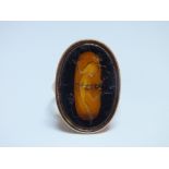 A CAVED OVAL INTAGLIO RING, D 2.5 cm, rig size O