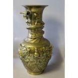 A WELL CAST ORIENTAL BRASS BALUSTER VASE BEARING SIX CHARACTER MARK TO THE BASE, the body with three