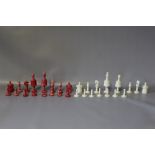 A TURNED CHESS SET, H 8.5 cm