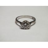 AN 18CT WHITE GOLD DIAMOND SOLITAIRE RING, the brilliant cut diamond being of an estimated 0.50