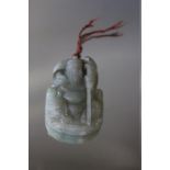A CHINESE TYPE JADE TABLET OF AN IMMORTAL HOLDING A STAFF, H 5.5 cm