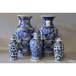 A PAIR OF CHINESE BLUE AND WHITE BALUSTER VASES, each with an all over floral pattern, H 30 cm,