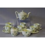 A BELLEEK SECOND PERIOD CLOVER SHAPED TEA SET, comprising teapot, cream jug, sugar bowl with six