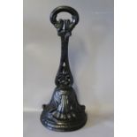 A CAST METAL DOOR STOP, H 34.5 cm