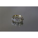 A FIVE STONE OLD CUT DIAMOND RING, ring size K