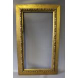 A 19TH CENTURY GOLD FRAME WITH DECORATIVE INSIDE EDGE, frame W 8 cm, rebate approx 38 x 76 cm