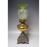 AN EARLY 20TH CENTURY OIL LAMP, with Duplex burner, brass reservoir, reticulated cast base and