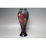 A MOORCROFT FINCHES PATTERN SLENDER BALUSTER VASE, impressed marks to the base and 'W.M' marks, H 28