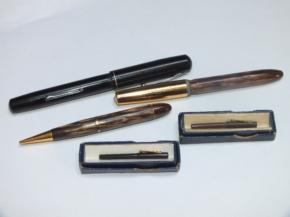 TWO BOXED MINIATURE WATERMAN'S IDEAL FOUNTAIN PENS, L 4 cm, together with a Waterman's Junior