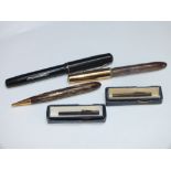 TWO BOXED MINIATURE WATERMAN'S IDEAL FOUNTAIN PENS, L 4 cm, together with a Waterman's Junior