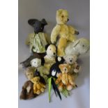 A COLLECTION OF VINTAGE AND MODERN TEDDY BEARS ETC, to include a vintage monkey hand puppet, a