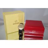 A HALLMARKED 9 CT GOLD OMEGA GENEVE WRIST WATCH, with two boxes, Dia 3.25 cmCondition Report:on