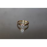 AN 18CT DIAMOND SOLITAIRE RING OF AN ESTIMATED 1/2 CARAT, ring size R