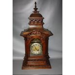 A LARGE AND IMPRESSIVE LATE 19/EARLY 20TH CENTURY WALNUT MANTEL CLOCK BY GUSTAV BECKER, the well