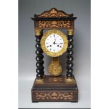 A LATE 19TH CENTURY FRENCH ROSEWOOD AND INLAID PORTICO CLOCK, the circular cased movement with