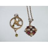 AN EDWARDIAN YELLOW METAL SEED PEARL AND GARNET SET PENDANT ON CHAIN, indistinct marks to reverse,