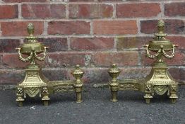 A PAIR OF LATE 19TH EARLY 20TH CENTURY BRASS FIRE DOGS, in the classical Empire style, H 38 cm (2)