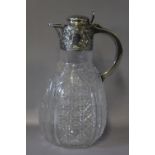 A HALLMARKED SILVER TOPPED CUT GLASS CLARET JUG - SHEFFIELD 1897, H 23 cm